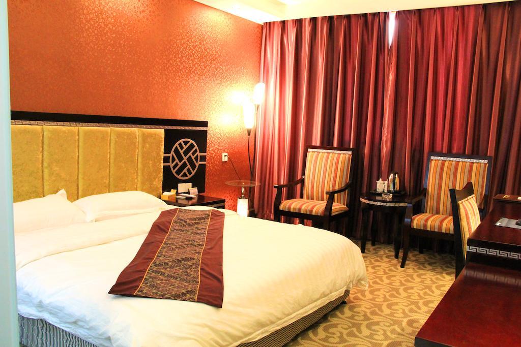Jiuxiang Hotel Jiuzhaigou Værelse billede