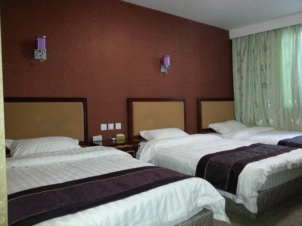 Jiuxiang Hotel Jiuzhaigou Værelse billede
