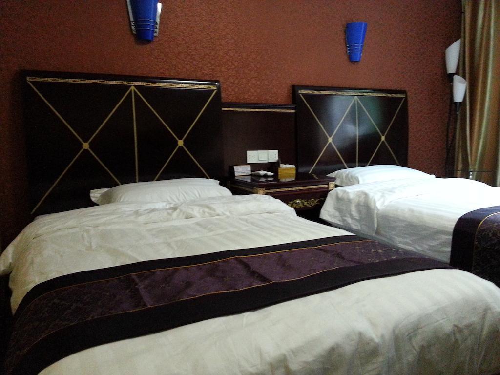 Jiuxiang Hotel Jiuzhaigou Værelse billede