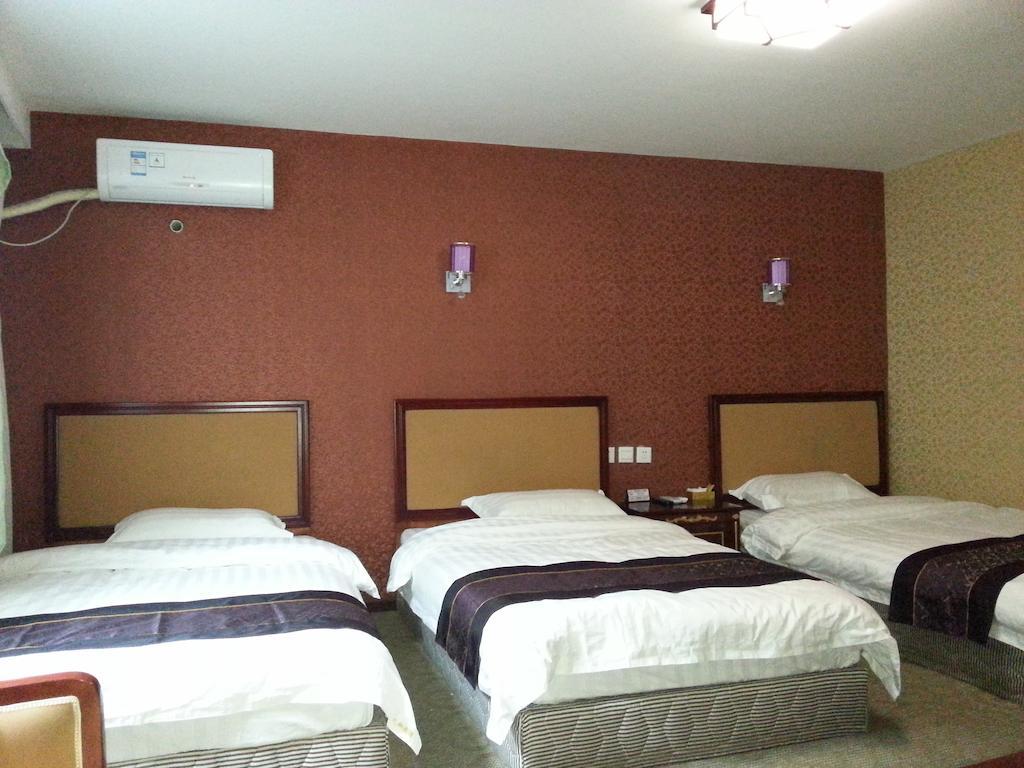 Jiuxiang Hotel Jiuzhaigou Værelse billede
