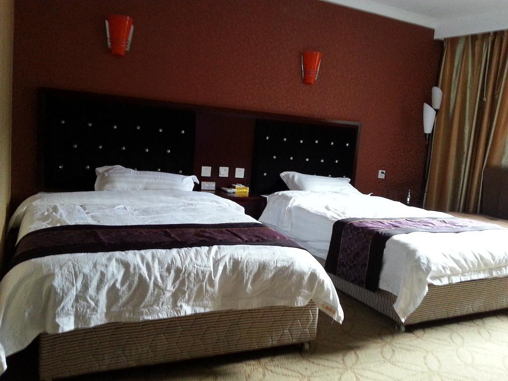Jiuxiang Hotel Jiuzhaigou Værelse billede