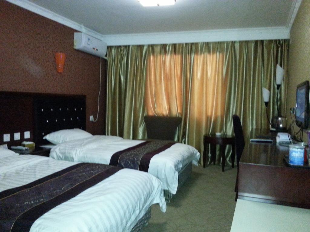 Jiuxiang Hotel Jiuzhaigou Værelse billede