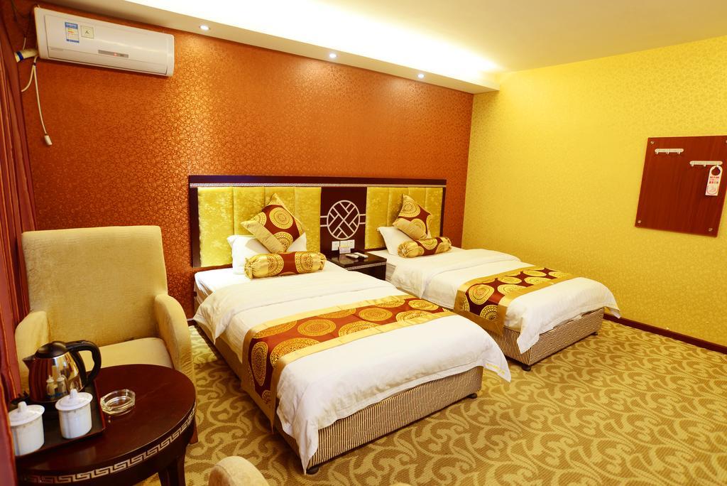 Jiuxiang Hotel Jiuzhaigou Værelse billede