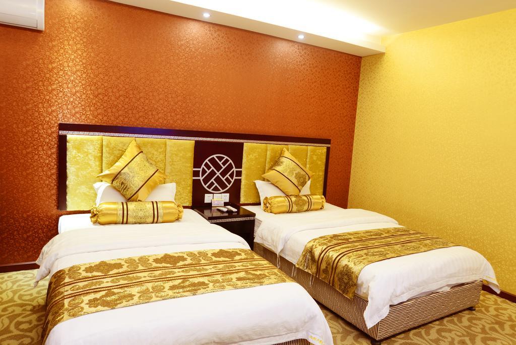 Jiuxiang Hotel Jiuzhaigou Værelse billede